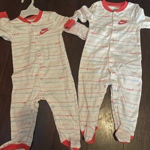 2 Nike playsuits